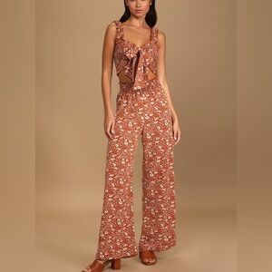 Two piece palazzo pant and smocked top outfit complete with belt/sash